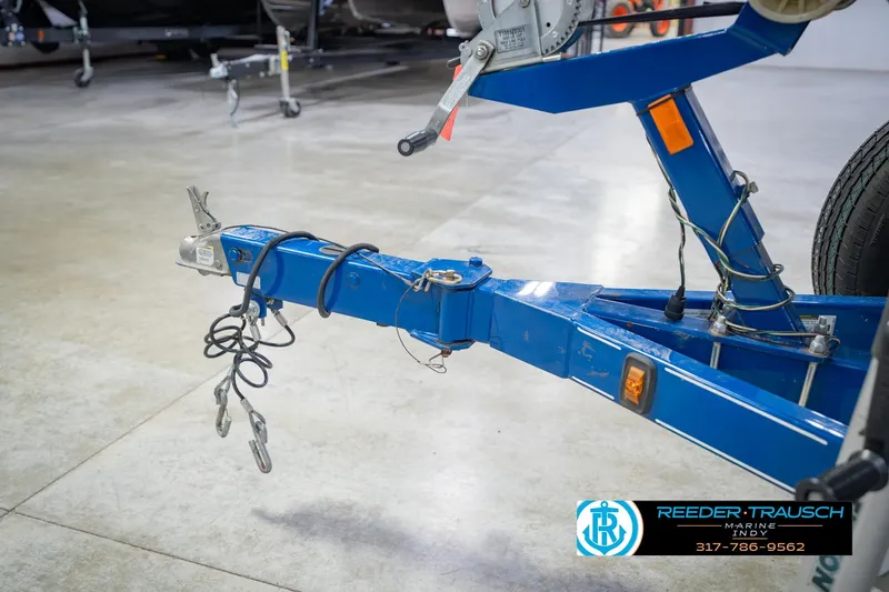 Slide: The Image of Trailer hitch of a 2015 Regal 2000 ESX Bowrider in a showroom. - 52