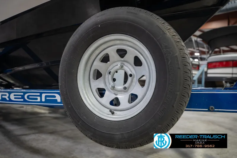 Slide: The Image of Trailer wheel of a 2015 Regal 2000 ESX Bowrider boat at Reeder-Trausch Marine. - 55