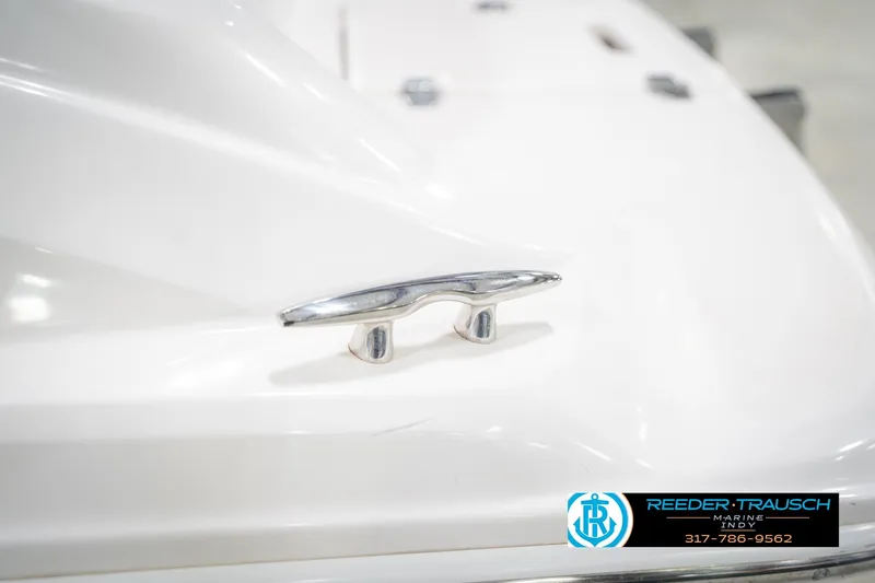 Slide: The Image of 2015 Regal 2000 ESX Bowrider boat cleat detail with Reeder Trausch Marine logo. - 58