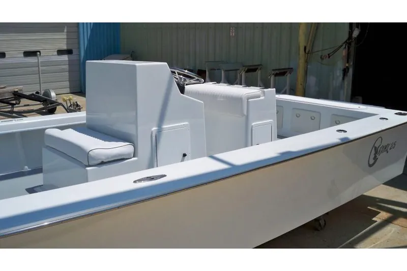 Slide: The Image of Manufacturer Provided Image: 2026 C-Hawk 25 Center Console boat with sleek design and spacious seating. - 8