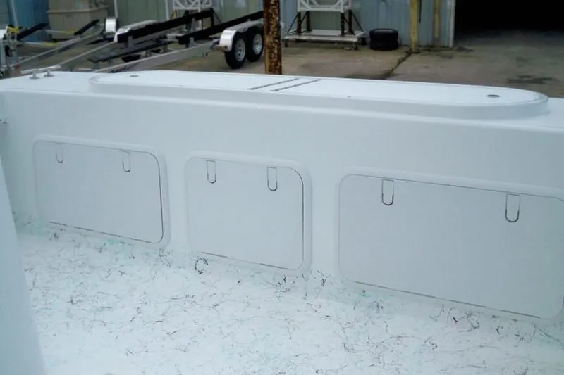 Slide: The Image of Manufacturer Provided Image: 2026 C-Hawk 25 Center Console boat with storage compartments on deck. - 9