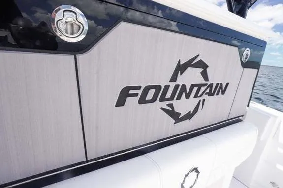 Slide: The Image of 2023 Fountain 38 Tournament Edition boat logo on sleek paneling. - 15