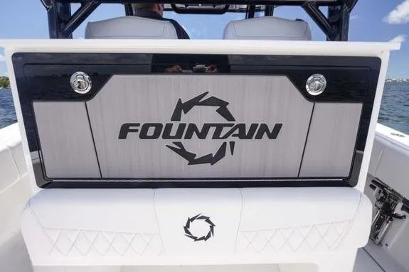 Slide: The Image of 2023 Fountain 38 Tournament Edition boat interior with logo, featuring sleek design elements. - 16