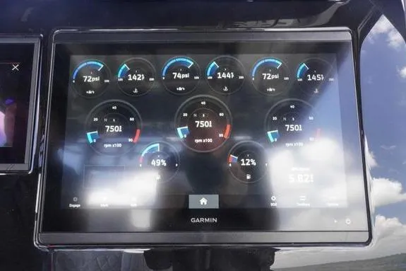 Slide: The Image of Garmin display on 2023 Fountain 38 Tournament Edition boat showing engine metrics and performance data. - 22