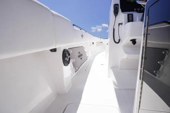 Slide: The Image of 2023 Fountain 38 Tournament Edition boat interior with sleek white design and modern equipment. - 26