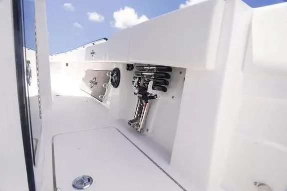 Slide: The Image of 2023 Fountain 38 Tournament Edition boat deck with storage compartments and sleek design. - 34