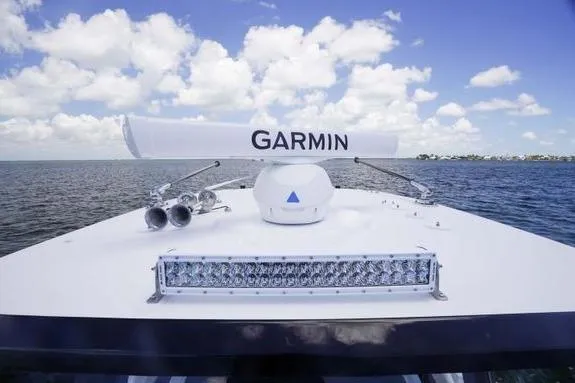 Slide: The Image of 2023 Fountain 38 Tournament Edition boat with Garmin radar on open water. - 39
