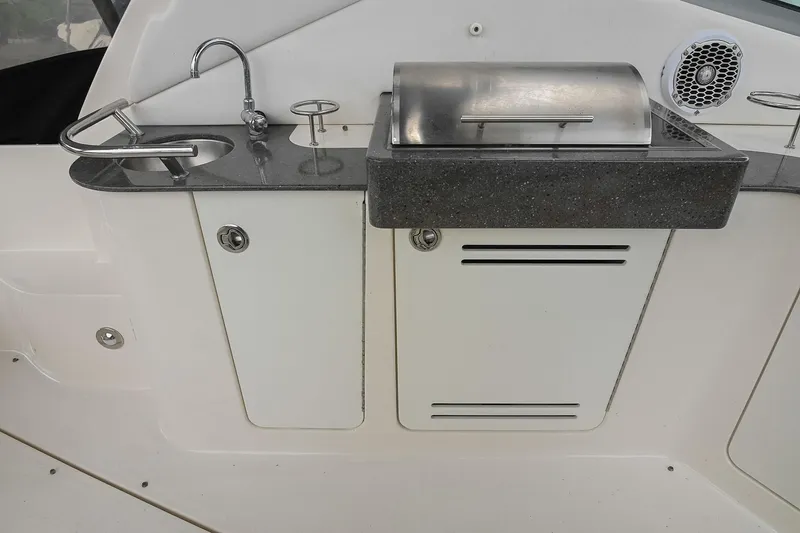Slide: The Image of Luxury yacht kitchenette with sink and grill, Sea Ray Sundancer 330, 2012 model. - 17