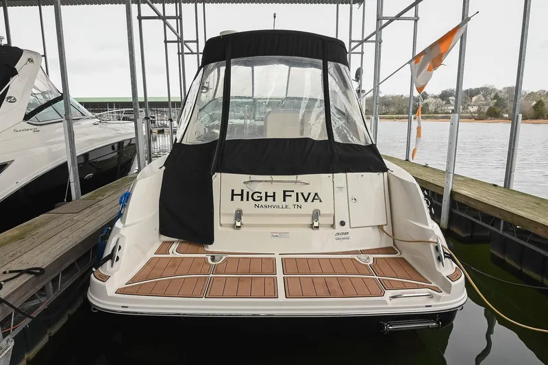 Slide: The Image of 2012 Sea Ray Sundancer 330 docked, rear view with "High Fiva" name, Nashville, TN. - 3