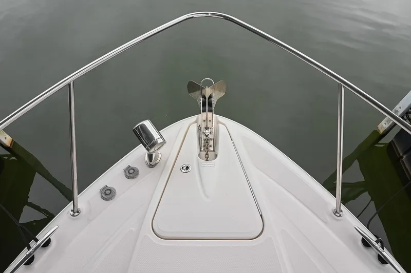 Slide: The Image of Bow of 2012 Sea Ray Sundancer 330 with anchor and spotlight. - 52