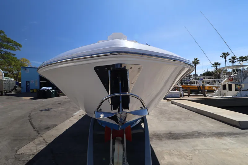 Slide: The Image of Front view of 2026 Caymas 291 boat at marina under clear blue sky. - 10