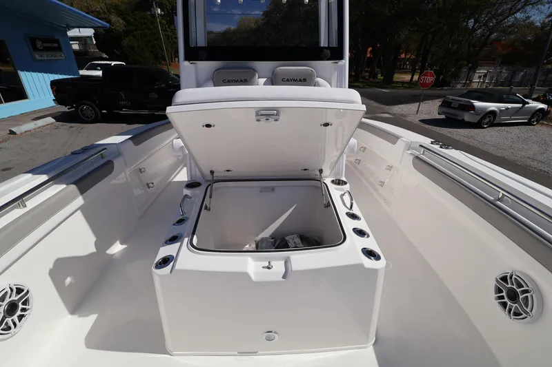 Slide: The Image of 2026 Caymas 291 boat interior with open storage compartment and seating. - 24