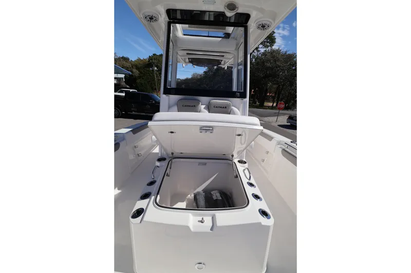 Slide: The Image of 2026 Caymas 291 boat interior with open storage compartment and seating. - 25