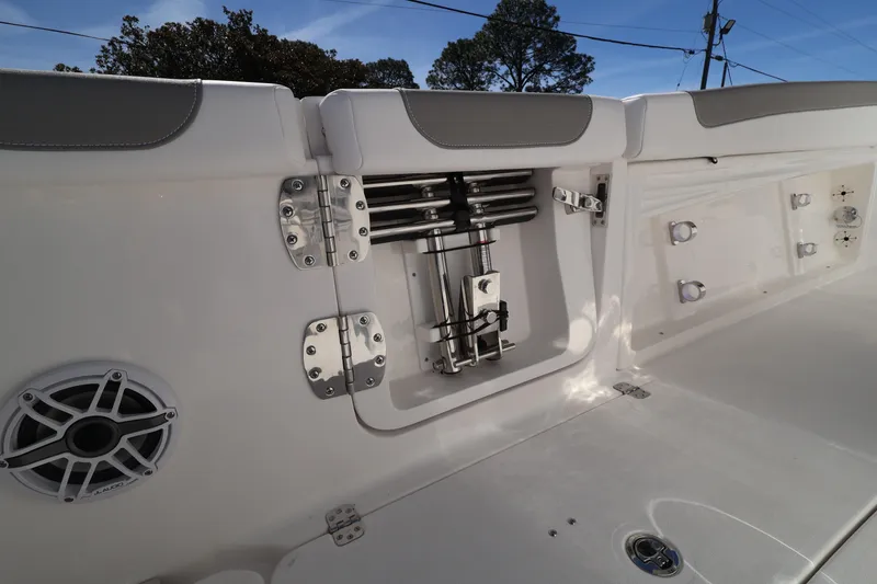 Slide: The Image of 2026 Caymas 291 boat interior detail with speaker and storage compartment. - 34