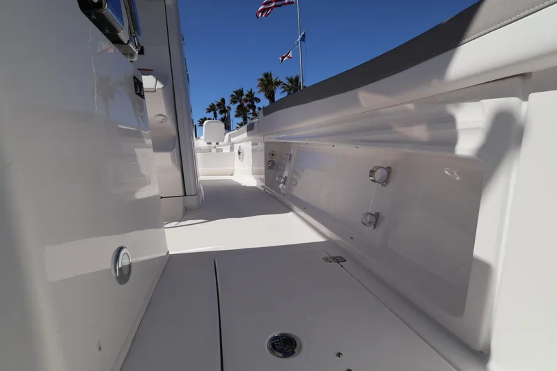 Slide: The Image of 2026 Caymas 291 boat interior with sleek white design and visible deck features. - 41