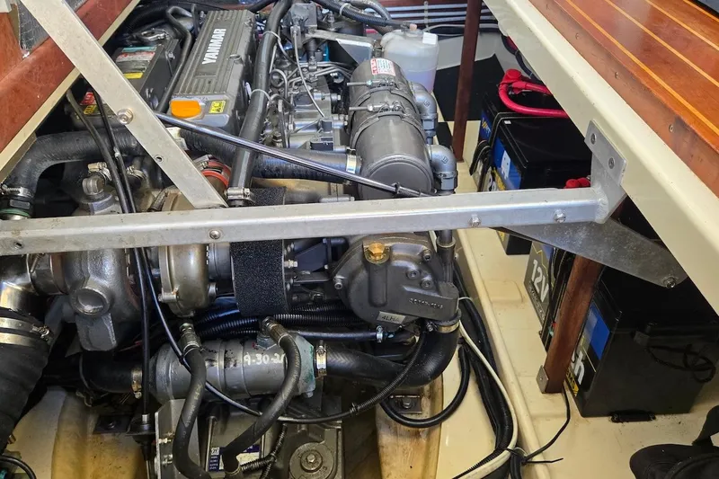Slide: The Image of Engine compartment of a 2005 Camano 31 Troll boat with visible Yanmar engine. - 29