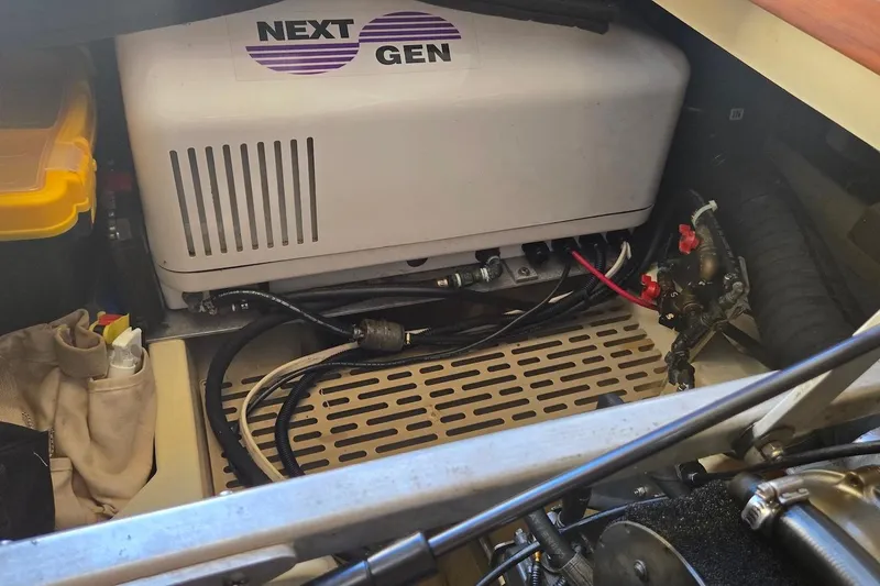 Slide: The Image of Engine compartment of 2005 Camano 31 Troll with Next Gen generator. - 30