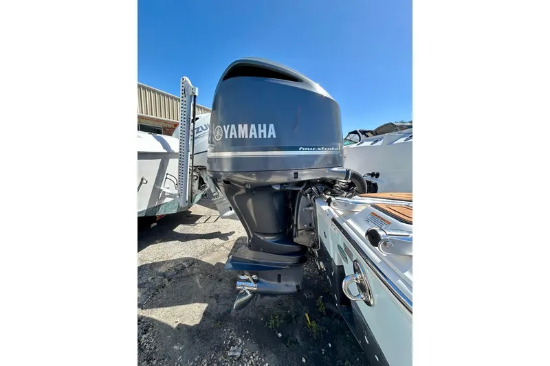 Slide: The Image of 2017 Seafox 288 Commander with Yamaha outboard motor, parked outdoors. - 27