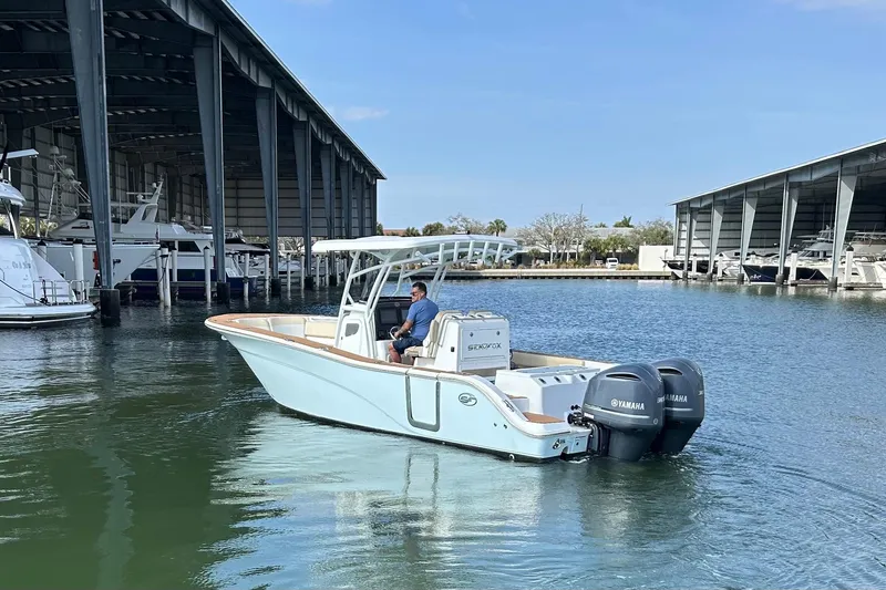 Slide: The Image of 2017 Seafox 288 Commander boat with Yamaha engines in marina setting. - 3