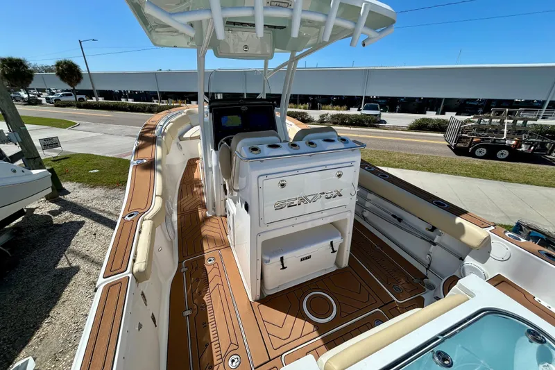 Slide: The Image of 2017 Seafox 288 Commander boat with spacious deck and modern console design. - 6