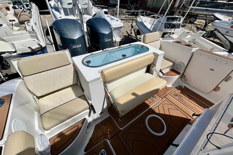 Slide: The Image of 2017 Seafox 288 Commander boat interior with seating and twin Yamaha 300 engines. - 9