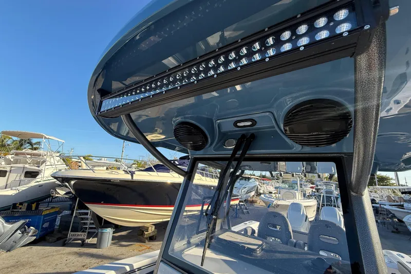 Slide: The Image of 2026 Sea Pro 292 DLX boat with advanced lighting and speaker system. - 41