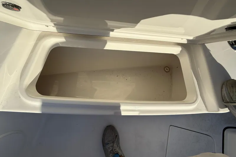 Slide: The Image of Open storage compartment on 2026 Sea Pro 292 DLX boat deck. - 45