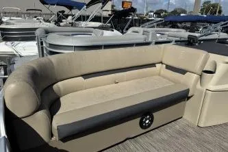 Slide: The Image of 2022 Godfrey Sweetwater 2286 C pontoon boat with beige seating and modern design. - 5