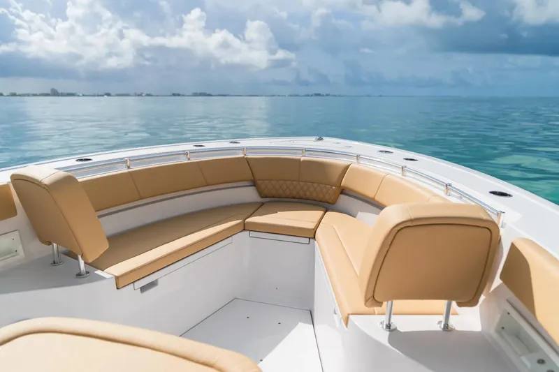 Slide: The Image of Manufacturer Provided Image: 2025 Sportsman Heritage 321 Center Console boat with tan seating on calm ocean. - 4