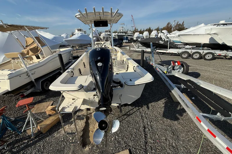 Slide: The Image of 2022 Carolina Skiff 21LS boat on trailer in marina storage area. - 8