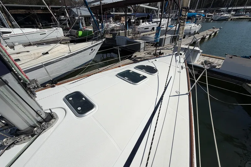Slide: The Image of Sailboat deck view of 1996 Beneteau First 42s7 docked at marina. - 13
