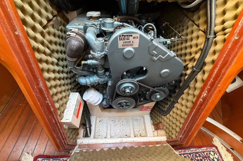 Slide: The Image of Engine compartment of a 1996 Beneteau First 42s7 sailboat with Perkins engine. - 26