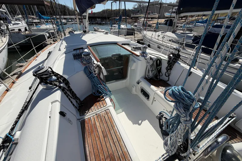 Slide: The Image of Cockpit of a 1996 Beneteau First 42s7 sailboat with ropes and wooden accents. - 7