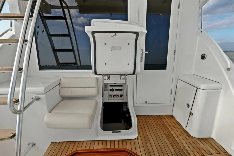 Slide: The Image of 2013 Tiara Yachts 3900 Convertible interior with seating and control panel. - 41