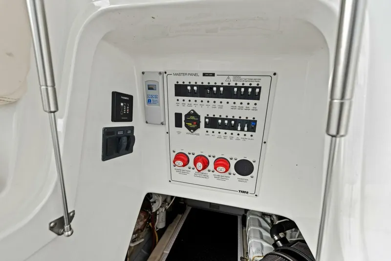 Slide: The Image of Electrical control panel on a 2013 Tiara Yachts 3900 Convertible boat. - 42