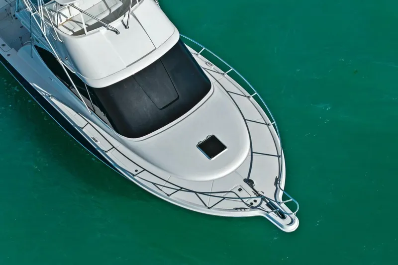 Slide: The Image of Aerial view of 2013 Tiara Yachts 3900 Convertible on turquoise water. - 57