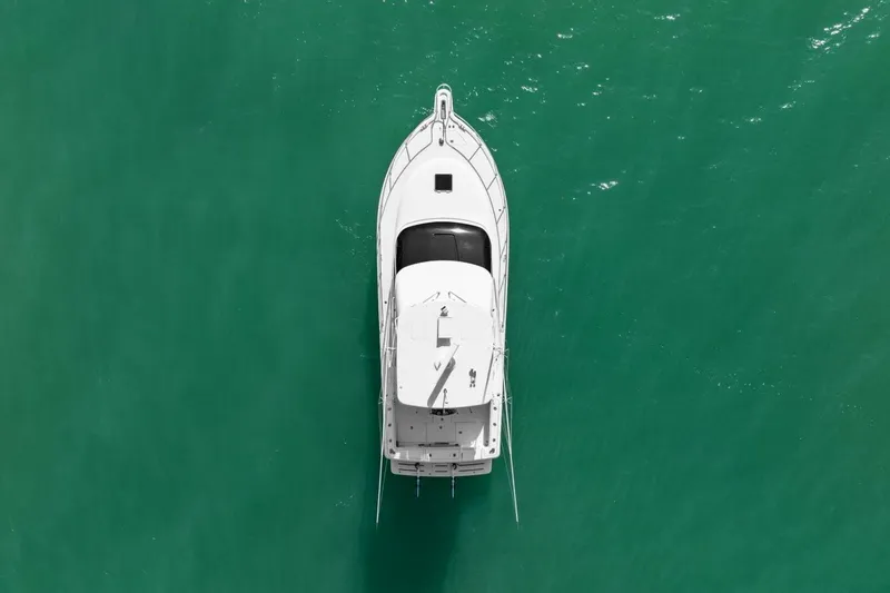 Slide: The Image of Overhead view of 2013 Tiara Yachts 3900 Convertible on turquoise water. - 60