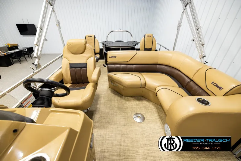 Slide: The Image of 2019 Lowe SF 212 Sport Fish pontoon boat interior with tan and brown seating. - 14
