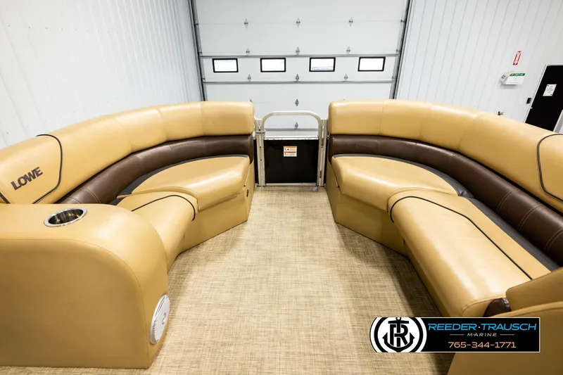 Slide: The Image of 2019 Lowe SF 212 Sport Fish boat interior with tan and brown seating. - 18