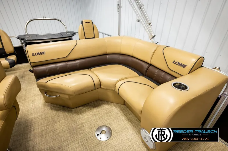 Slide: The Image of 2019 Lowe SF 212 Sport Fish boat interior with tan and brown seating. - 20