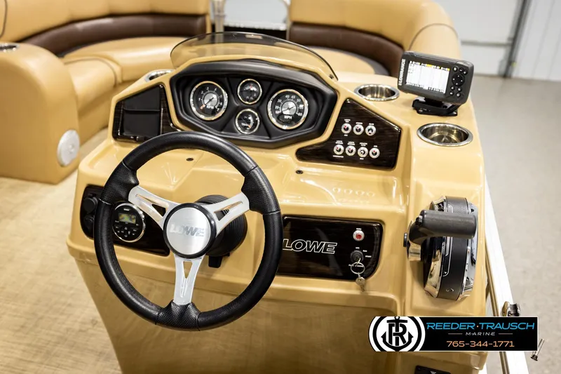 Slide: The Image of 2019 Lowe SF 212 Sport Fish boat dashboard with steering wheel and control panel. - 24
