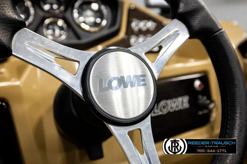 Slide: The Image of Steering wheel of 2019 Lowe SF 212 Sport Fish boat with dashboard view. - 26