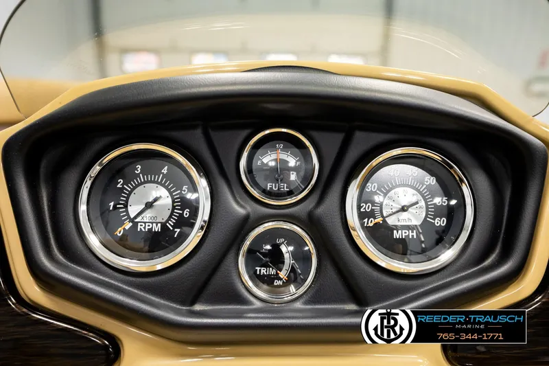 Slide: The Image of Dashboard of 2019 Lowe SF 212 Sport Fish boat with RPM, fuel, and speed gauges. - 29