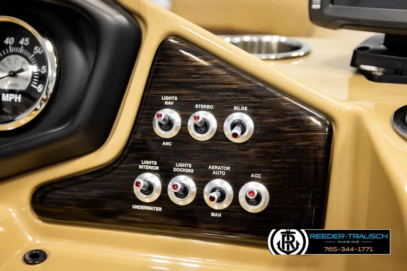 Slide: The Image of Control panel of 2019 Lowe SF 212 Sport Fish boat with various switches and speedometer. - 30