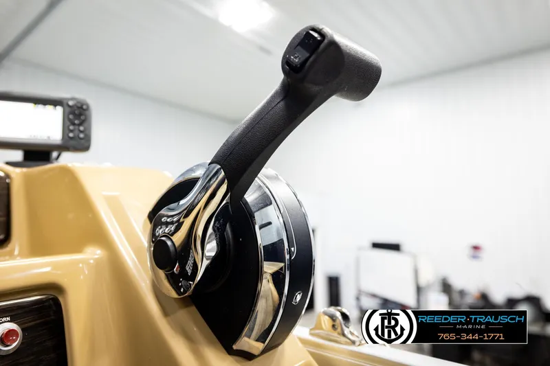 Slide: The Image of Close-up of 2019 Lowe SF 212 Sport Fish boat throttle control in a showroom. - 33
