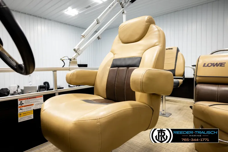 Slide: The Image of 2019 Lowe SF 212 Sport Fish boat interior with tan and brown seating. - 34