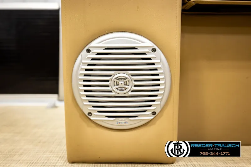 Slide: The Image of Speaker on 2019 Lowe SF 212 Sport Fish boat, beige interior, Reeder-Trausch Marine logo. - 38