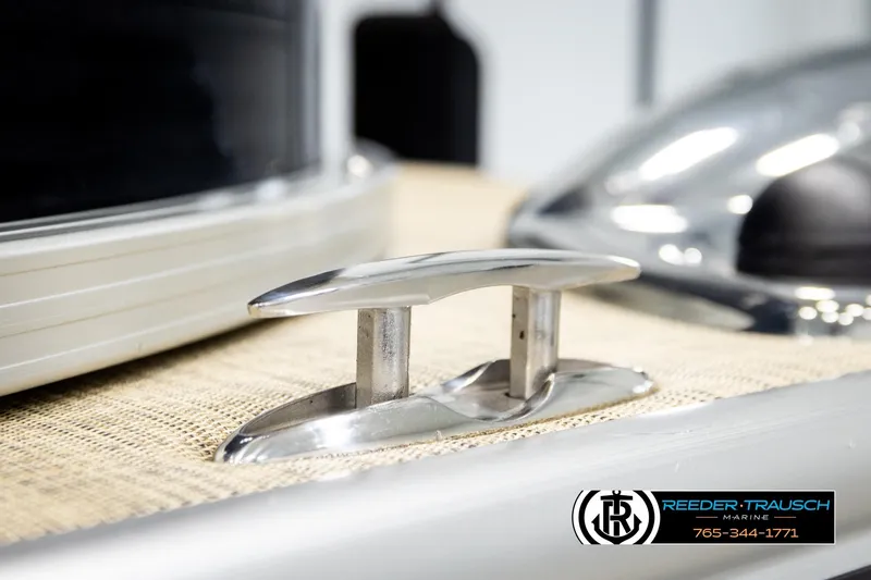 Slide: The Image of 2019 Lowe SF 212 Sport Fish boat cleat detail with Reeder-Trausch Marine logo. - 51