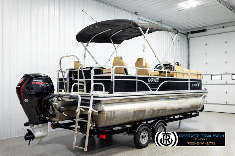 Slide: The Image of 2019 Lowe SF 212 Sport Fish pontoon boat with Mercury Pro XS engine in a showroom. - 6