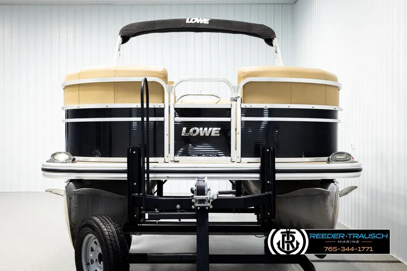 Slide: The Image of 2019 Lowe SF 212 Sport Fish pontoon boat on trailer in showroom. - 8